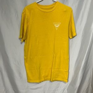 Van’s yellow T-shirt